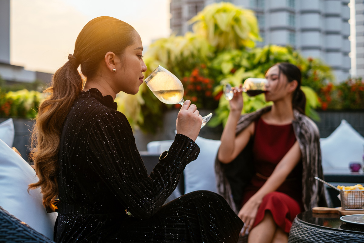 lifestyle photography Movenpick hotel Bangkok rooftop wine bar
