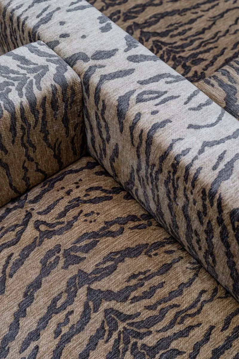 Close-up of animal-print upholstery fabric on a seating area inside Givenchy Siam Paragon