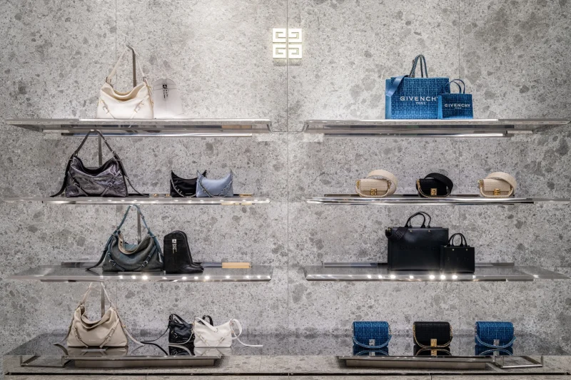 Wall of shelved Givenchy handbags and small leather goods at Siam Paragon boutique