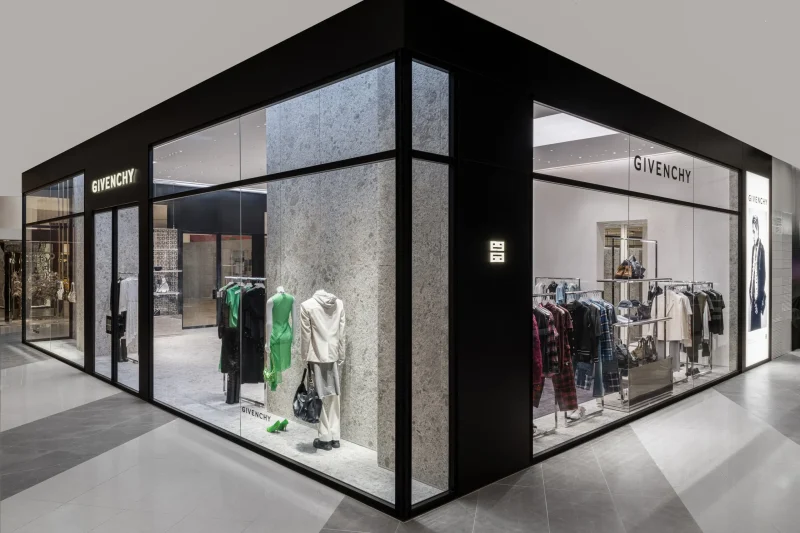 Givenchy Siam Paragon corner storefront with mannequin displays and menswear rack visible through windows