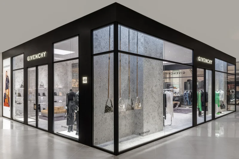 Corner exterior view of the Givenchy boutique at Siam Paragon, Bangkok, with full window displays